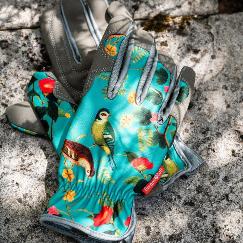 Flora and Fauna Gloves: women's gardening gloves with a botanical songbird and foliage print, cushioned palm, and gathered wrist